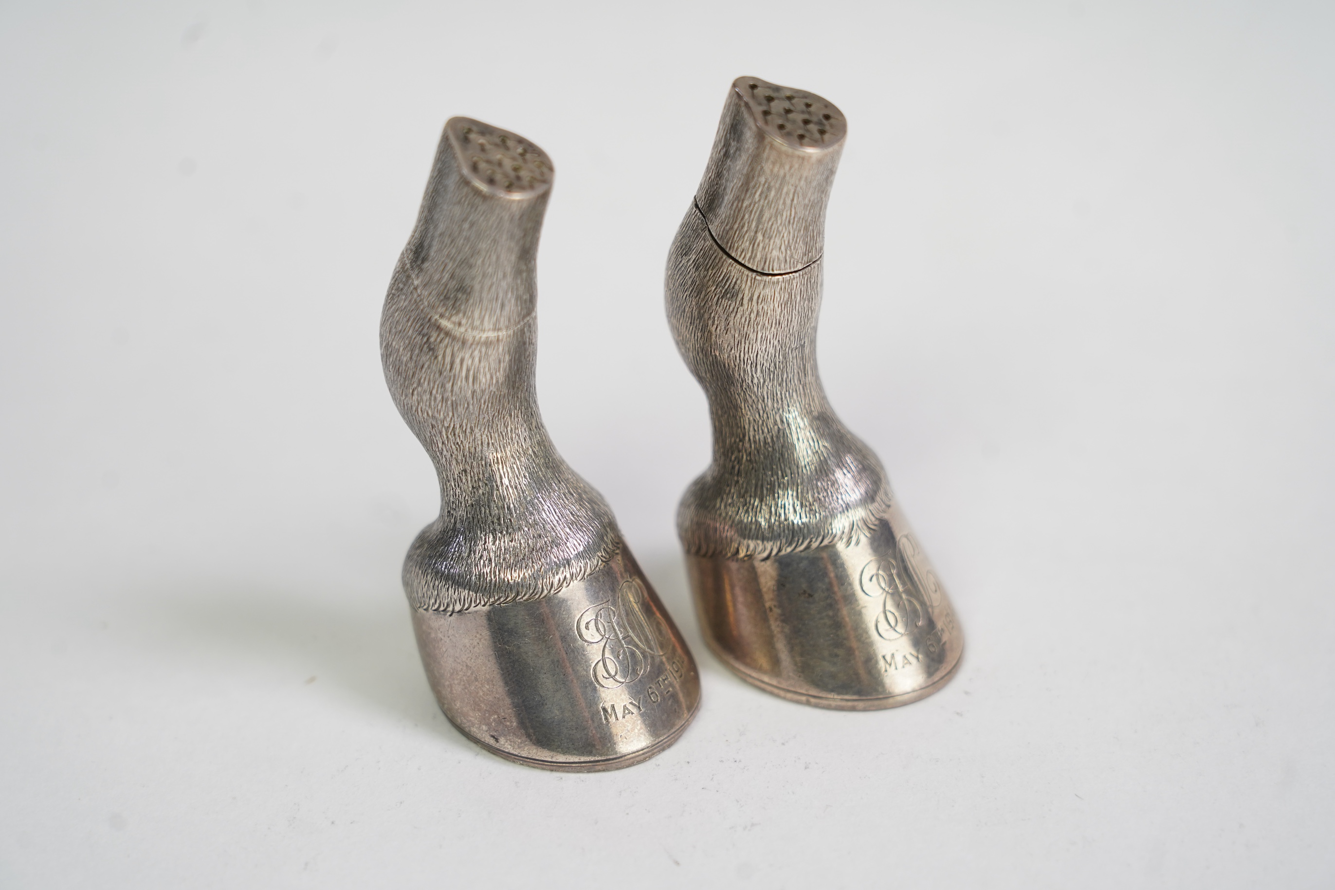 A pair of Edwardian novelty silver condiments modelled and a horse's fetlock and hoof, makers mark rubbed